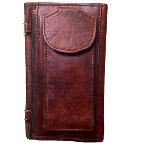 Brown Wallet, 7.5” Long, 5” Wide, lots of card slots. Feels like lamb Leather—